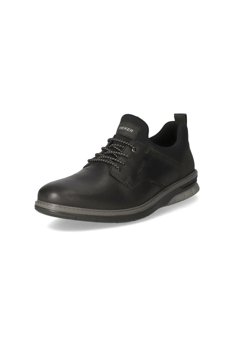 Chaussure noire en cuir à lacets avec un bout arrondi, semelle rembourrée et accents gris contrastants. Dotée d'une languette au talon pour un enfilage facile.
