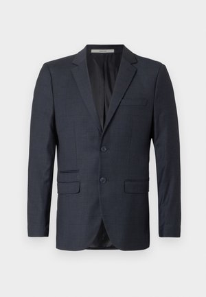 Mörkblå rutig kavaj gjord av texturerad tyg. Har två framfickor, en ficka på bröstet och två knappar.