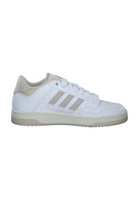 White sneakers with beige accents, featuring a smooth leather upper, rounded toe, three side stripes, and textured rubber sole.