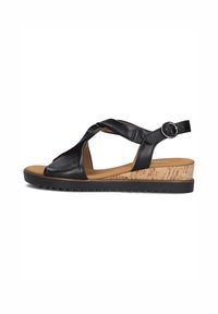 Zwarte leren plateau-sandalen met gekruiste banden, een kurk-textuur middenzool en een rubberen zool. Beschikt over een verstelbare enkelband.