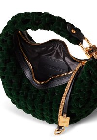 Green velvet handbag with a woven texture, black leather accents, gold zipper, and an interior fabric lining. Features a logo tag inside.