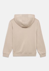 Felpa con cappuccio beige con coulisse, tessuto morbido, maniche lunghe e polsini e orlo a coste. Presenta un cappuccio arrotondato senza loghi visibili.