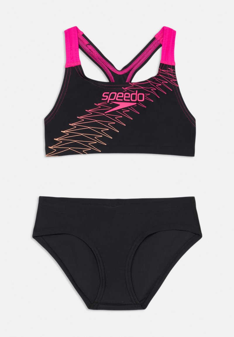 Conjunto de swimwear preto composto por um soutien desportivo com detalhes em rosa e padrões geométricos, combinado com parte de baixo de bikini preto correspondente.