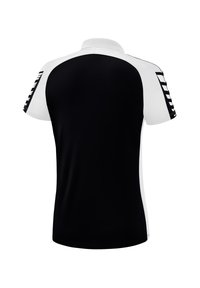 Zwart-wit polo shirt met een effen zwarte achterkant, witte kraag en zwarte accentstrepen op de schouders voor contrast en ontwerpelementen.