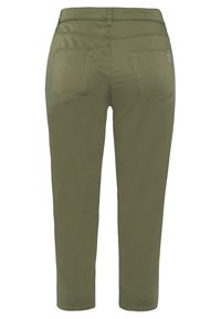 Olive green cropped pants made of soft cotton, featuring two back pockets and a fitted design with a smooth texture.