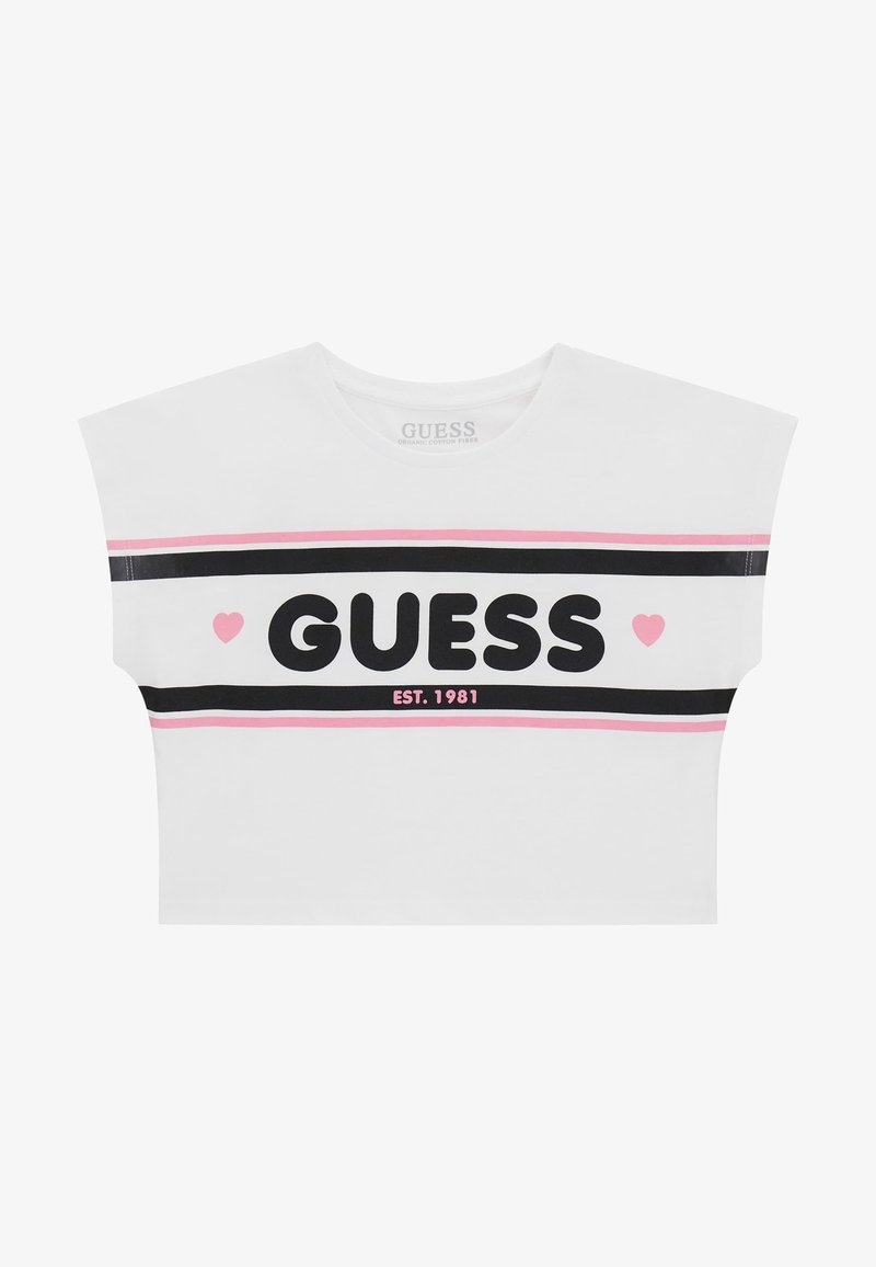 White cropped t-shirt made of organic cotton, featuring a black and pink striped design with "GUESS" and "EST. 1981" text in bold print.