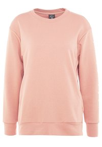 Sweatshirt rose avec une texture côtelée, un col rond et des manches longues. Détail notable : impression blanche le long de la manche gauche.