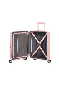 Valigia rigida di colore rosa chiaro con interno nero, dotata di tasca con zip, cinghie incrociate regolabili e ruote a 360 gradi.