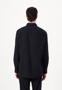 DRYKORN RAMIS - Button down-skjorte - blue
