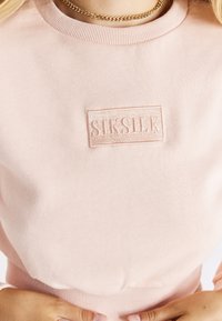 SIKSILK Sudadera - pink