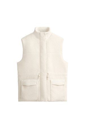 Witte fleece vest met hoge kraag, rits aan de voorkant en twee grote voorzakken, met een zachte textuur en een schoon, minimalistisch ontwerp.