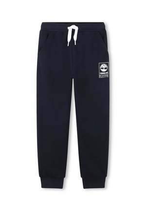 Marineblauwe joggingsbroek met witte trekkoord, zijzakken, elastische boorden en een wit Timberland-logo op de linker bovenbeen.