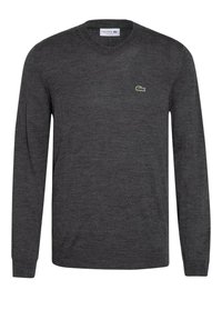Grauer Pullover mit langen Ärmeln aus weichem Stoff, mit Rundhalsausschnitt und kleinem grünem Lacoste-Logo auf der linken Brust.