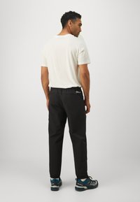 Jack Wolfskin PRELIGHT TRAIL PANTS  - Outdoor trousers - black