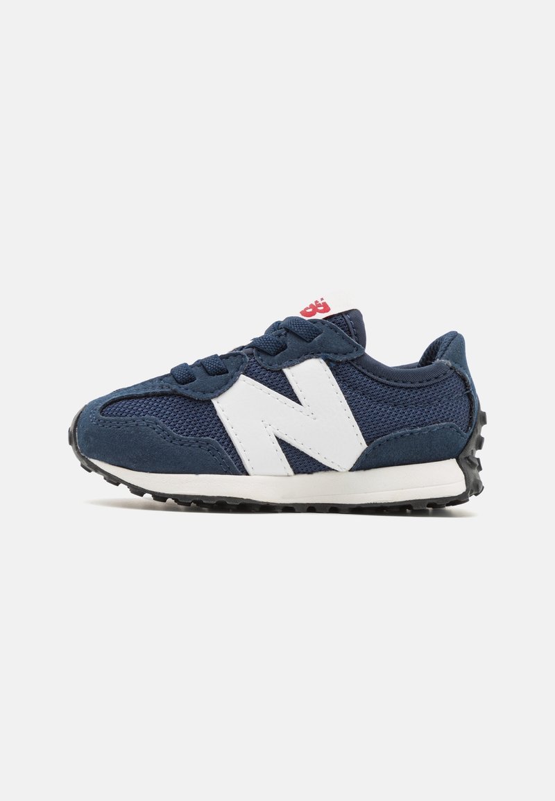 Navy blue sneaker with white accents, mesh and suede material, lace-up design, textured sole, and prominent 'N' logo on the side.