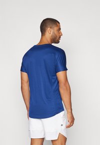 Nike Performance RAFA CHALLENGER - Spordi T-särk - blue void/laser blue