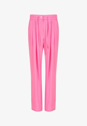 Pantalones rosa brillante de corte holgado con cinturilla elástica, cordón ajustable y cierre con botón dorado, colgados rectos sobre fondo blanco.