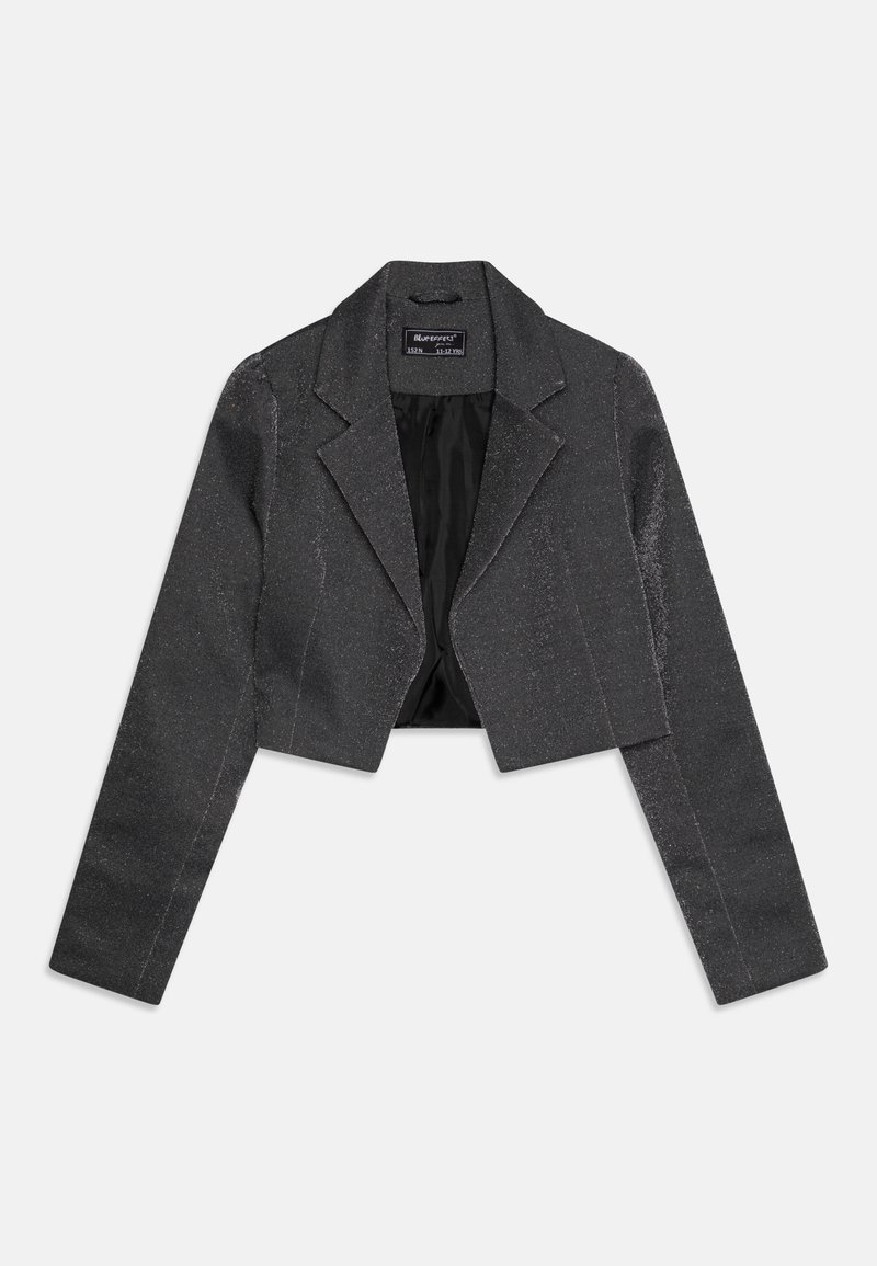 Veste courte gris foncé à manches longues, col à revers crantés, doublure intérieure noire, posée à plat sur un fond blanc.