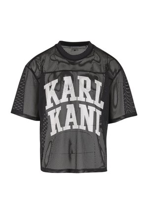 T-shirt noir à manches courtes en maille avec le grand texte blanc "KARL KANI" imprimé sur la poitrine.