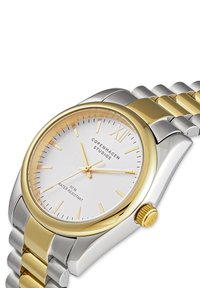 Silberne und goldene Armbanduhr mit weißem Ziffernblatt, goldenen Stundenmarkierungen, drei Zeigern und "Copenhagen Studios" Branding, wasserdicht bis zu 50 Metern.