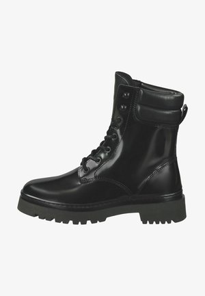 Black combat boot with a glossy finish, padded collar, and sturdy rubber sole. Features metal eyelets and a reinforced heel for support.