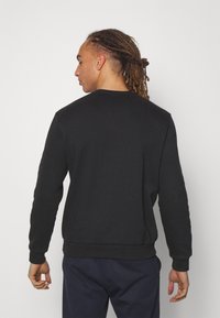 Champion BASIC CREWNECK - Mikina - black