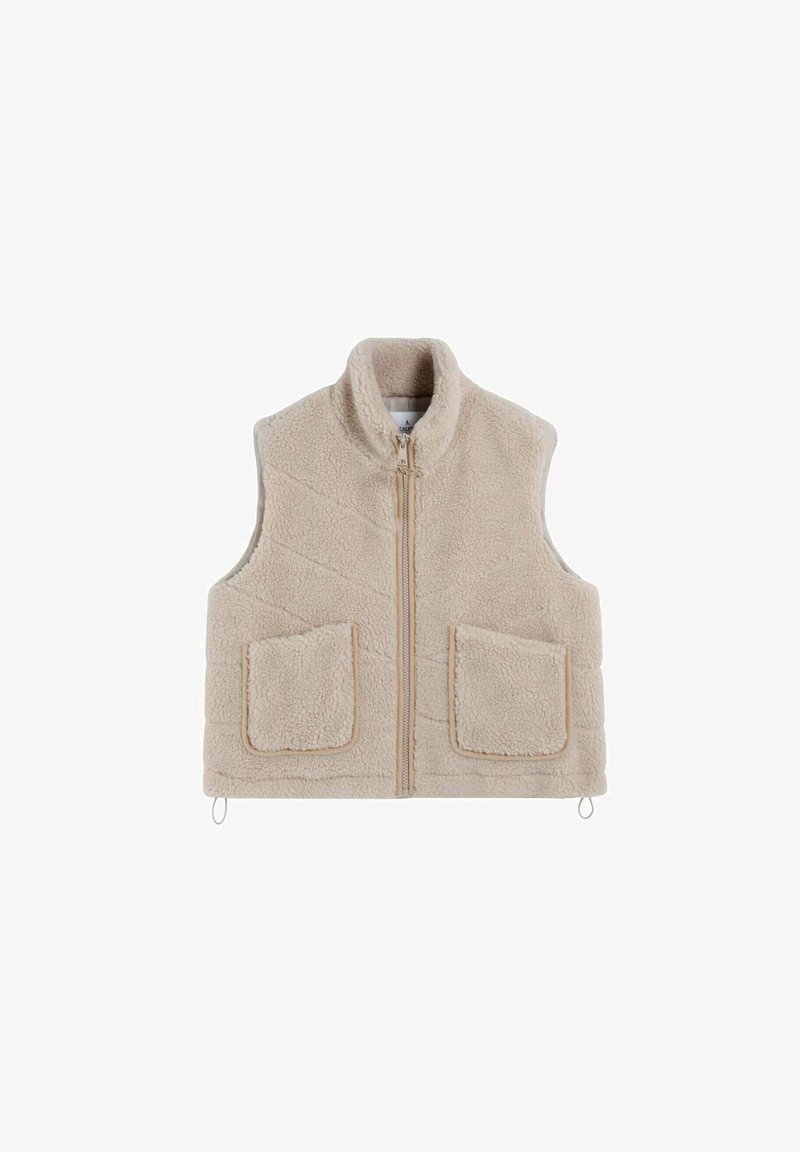 Beżowa bezrękawnik z polaru, z wysokim kołnierzem, zamkiem błyskawicznym z przodu, dwiema przednimi kieszeniami oraz pętlami do ściągacza na dolnej krawędzi.