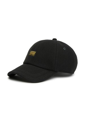 Casquette de baseball noire avec une visière incurvée et un petit patch logo jaune et noir G-Star Originals sur le panneau avant.