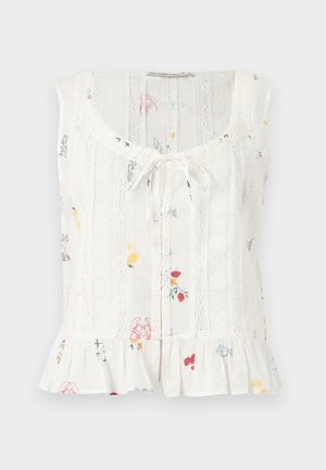 Hvid ærmeløs bluse med knapper foran, blonderpaneler, bindebånd ved halsudskæringen, flæsekant og små farverige frugt- og blomsterprint.