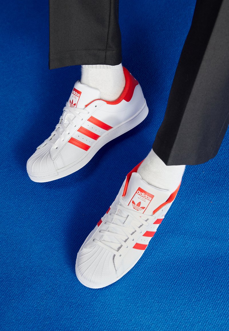 adidas Originals SUPERSTAR - Trainers - footwear white/vivid red/white - Zalando adidas Originals SUPERSTAR - Trainers - footwear white/vivid red/white - Zalando