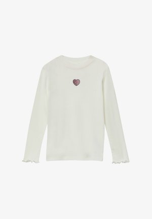 Langärmliges Creme-Oberteil mit einem runden Halsausschnitt, das ein kleines pinkes Glitzerherz und Rüsche an den Ärmeln hat.