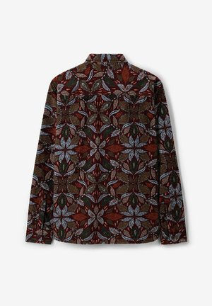 Langsleeve shirt in donkerbruin met een veelkleurig bloemenpatroon. Beschikt over een kraag en knoopsluiting aan de achterkant. Gladde textuur.