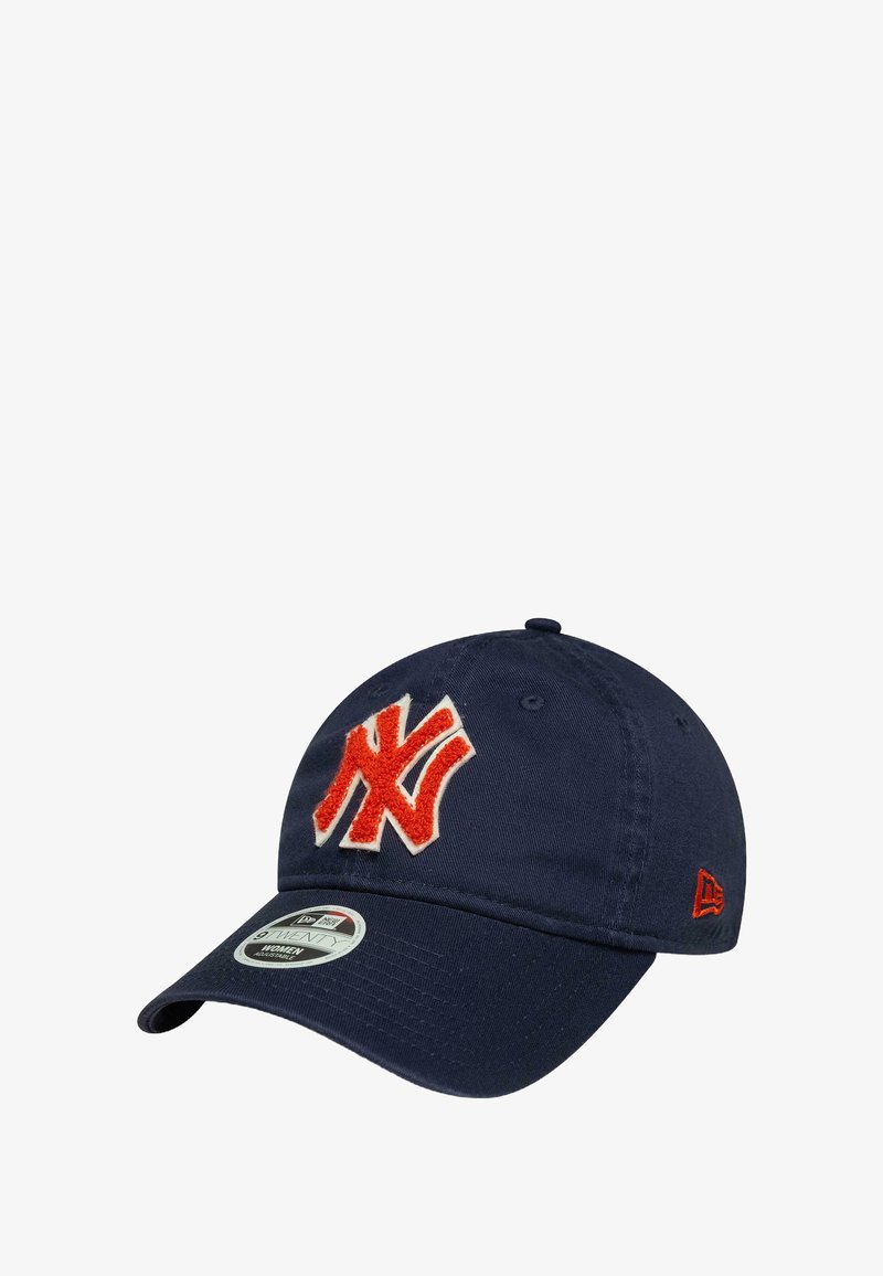 Navy blue cotton cap with a curved brim, featuring a large red and white embroidered logo on the front, and a small red accent on the side.