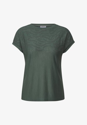 T-shirt à manches courtes vert foncé en tissu doux, avec un motif texturé en vagues dans une teinte plus foncée sur le devant.