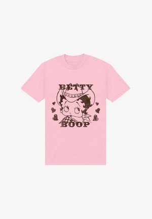 T-shirt en coton rose avec un personnage de dessin animé et un texte noir imprimé "BETTY BOOP", agrémenté de cœurs décoratifs, présentant un design vieilli.