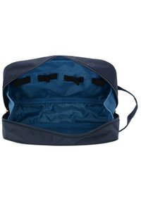 Borsa blu navy con zip, con un esterno morbido e un interno blu brillante. Dotata di cinghie in velcro interne per una facile organizzazione e accesso.