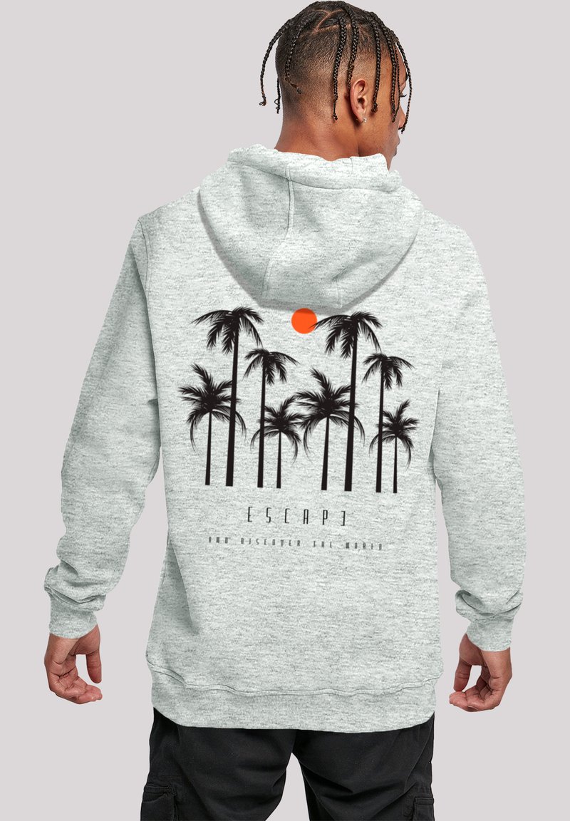 Light gray hoodie made of soft fabric featuring a black palm tree graphic and orange sun print on the back, with "ESCAPE" text below.