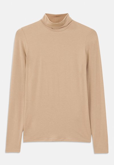 Peene pikad varrukad ja kõrge kaelusega turtleneck tops, mis on valmistatud pehmest ja tekstuurisest kangast; omab kitsast lõiget. Pole nähtavaid mustreid ega lisandusi.