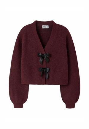 Cardigan corto bordeaux in morbido tessuto con scollatura a V profonda, maniche lunghe e due fiocchi neri sul davanti.