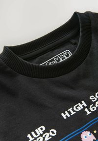 Next REGULAR FIT - OFFICIAL PAC-MAN  - Nyomott mintás póló - black