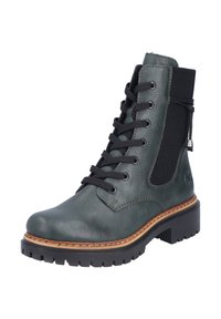 Bottine à lacets en cuir vert foncé avec un panneau texturé, des lacets noirs et un détail de couture contrastant en tan sur la semelle.