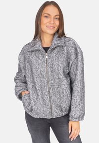 Graue Zip-Jacke aus Fleece mit strukturierter, flauschiger Oberfläche, mit Stehkragen und Seiten Taschen.