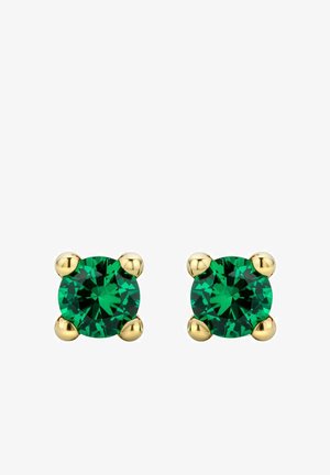 Pendientes de cristal redondo verde esmeralda, montados en metal dorado, con cuatro garras y un acabado liso y pulido.