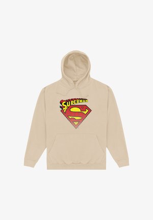Sweat à capuche beige avec un grand logo Superman rouge comportant du texte jaune, une poche avant et des cordons de serrage à la capuche.