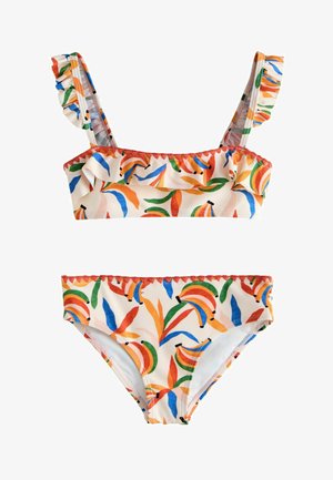 Tüdrukute kahene ujumisriietus volditud rihmadega ja värvilise banaani ning lehe trükiga kreemikal taustal.