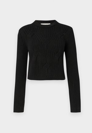 Pull noir en tricot avec un design cropped, des manches longues et des motifs côtelés texturés sur le devant et l'arrière.