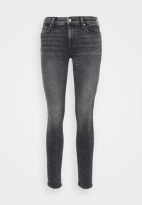 Jeans ajustados en denim gris oscuro, con una cintura de altura media, diseño minimalista, un tenue desvanecimiento y una clásica configuración de cinco bolsillos.