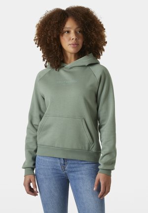 Groene hoodie met een zak aan de voorkant, ribgebreide zoom en manchetten. Heeft een minimalistisch logo op de borst. Gemaakt van zacht, gewafeld materiaal.