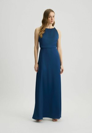 Long, sleeveless dress in a deep blue color. Features a high neckline and a smooth, flowing texture. Accentuates the waistline elegantly.