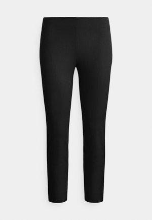 Svarte, elastiske leggings med glatt tekstur og smal passform. Ingen synlige sømmer eller mønstre. Full lengde, med elastisk midjebånd.